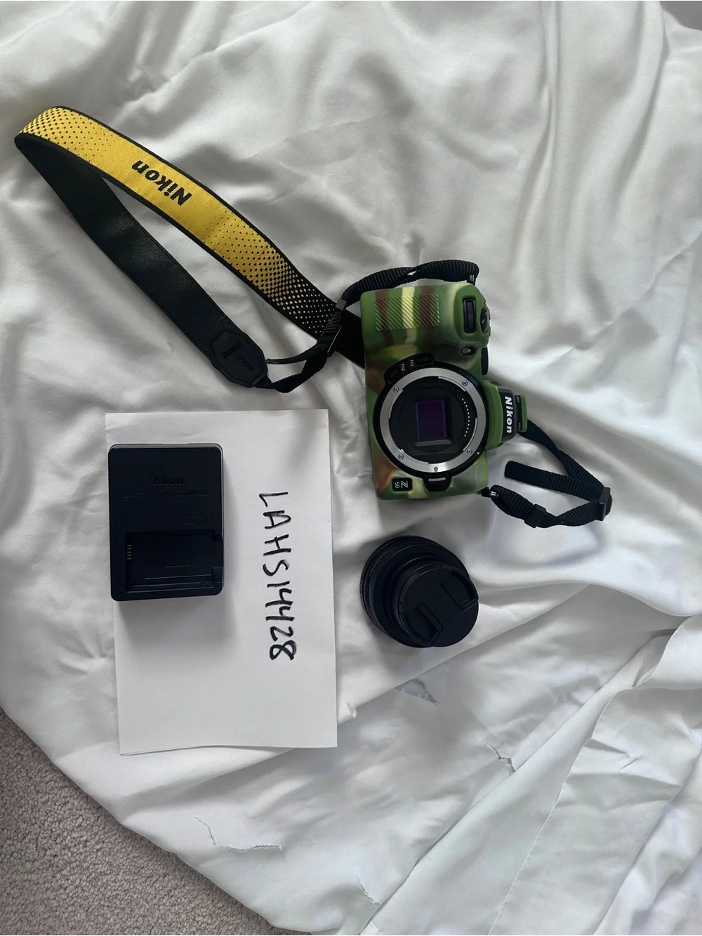 Nikon Digital Camera Body with Green Camo Skin and Yellow Nikon Strap